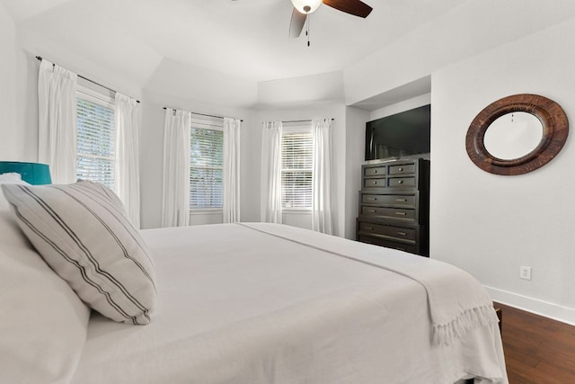 114 Fred Couples Dr, Round Rock, TX 78664 - bedroom with dark wood finished floors, baseboards, and ceiling fan