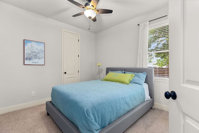 114 Fred Couples Dr, Round Rock, TX 78664 - carpeted bedroom with baseboards and a ceiling fan