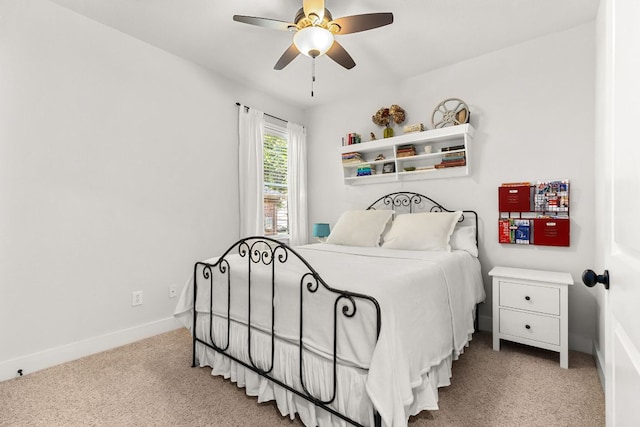 114 Fred Couples Dr, Round Rock, TX 78664 - carpeted bedroom featuring baseboards and ceiling fan