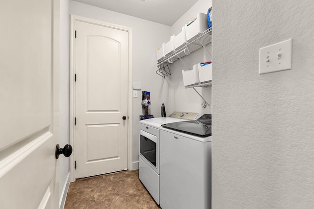 114 Fred Couples Dr, Round Rock, TX 78664 - laundry room featuring washer and dryer