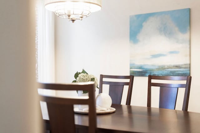 114 Fred Couples Dr, Round Rock, TX 78664 - dining area with a chandelier