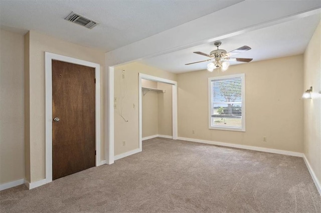 461 Skyline Rdg, San Marcos, TX 78666 - unfurnished bedroom featuring carpet flooring, baseboards, a closet, and a ceiling fan