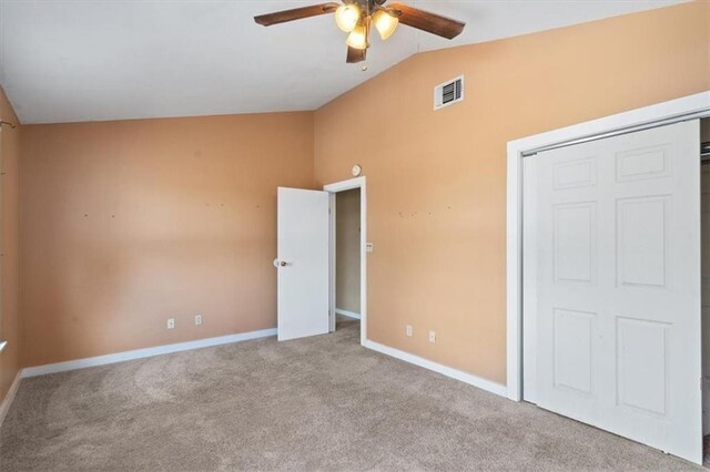 461 Skyline Rdg, San Marcos, TX 78666 - unfurnished bedroom with lofted ceiling, carpet flooring, baseboards, and a ceiling fan