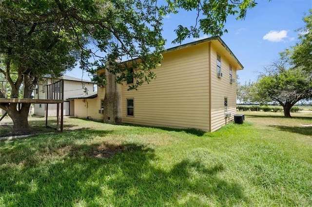 461 Skyline Rdg, San Marcos, TX 78666 - back of property with a yard and central AC