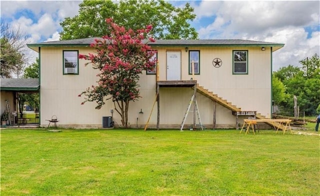 461 Skyline Rdg, San Marcos, TX 78666 - back of house featuring a yard and central AC