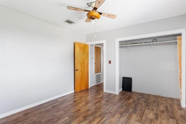 461 Skyline Rdg, San Marcos, TX 78666 - unfurnished bedroom with wood finished floors, a closet, baseboards, and ceiling fan