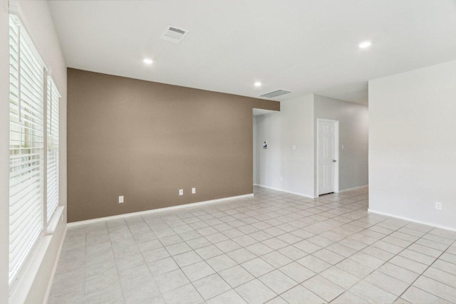 9701 Kensley Rose Dr, Killeen, TX 76542 - unfurnished room featuring recessed lighting, baseboards, and light tile patterned floors