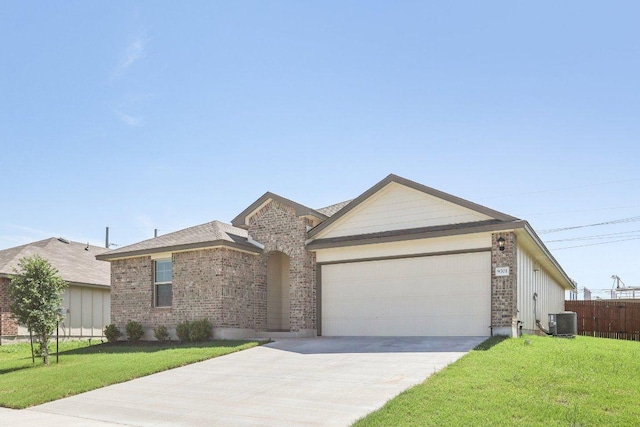 9701 Kensley Rose Dr, Killeen, TX 76542 - single story home featuring central AC, an attached garage, driveway, and brick siding