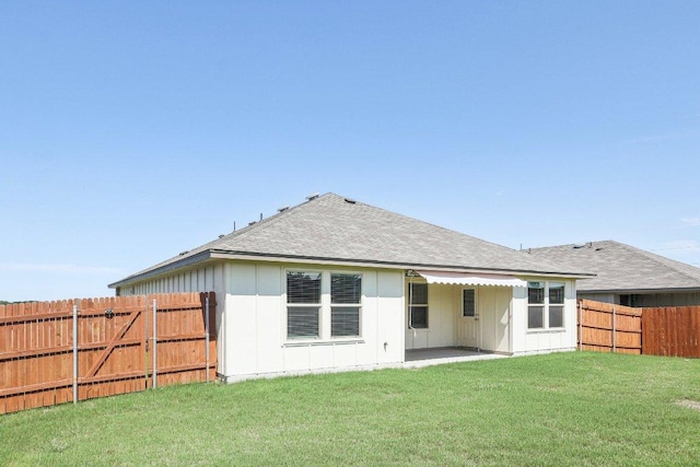 9701 Kensley Rose Dr, Killeen, TX 76542 - back of property with board and batten siding, a shingled roof, and a patio area