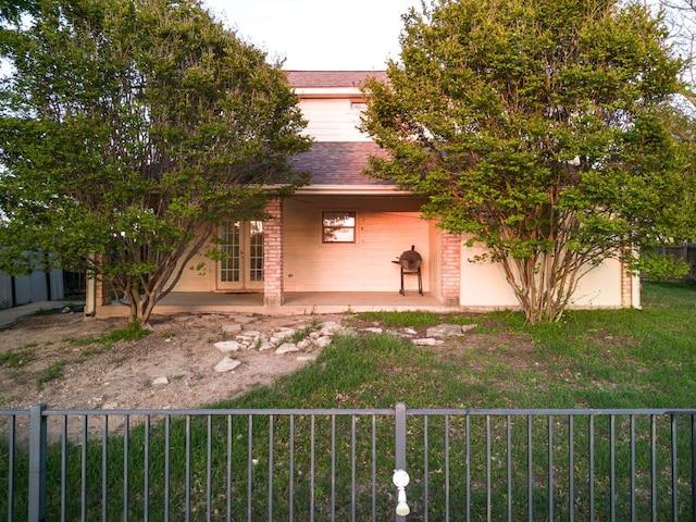 10 Saul St, Lampasas, TX 76550 - view of property exterior featuring french doors