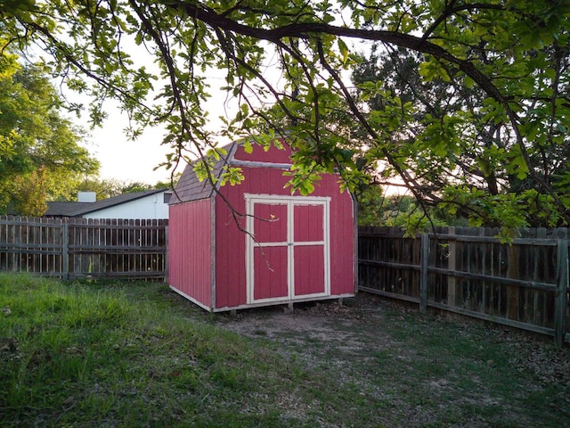 10 Saul St, Lampasas, TX 76550 - view of shed with a fenced backyard