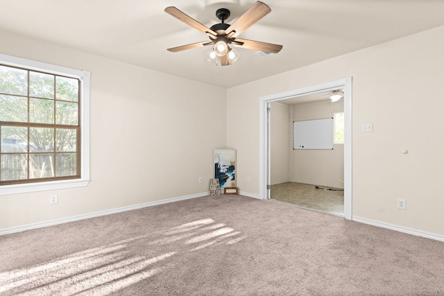 10 Saul St, Lampasas, TX 76550 - carpeted empty room with a ceiling fan and baseboards