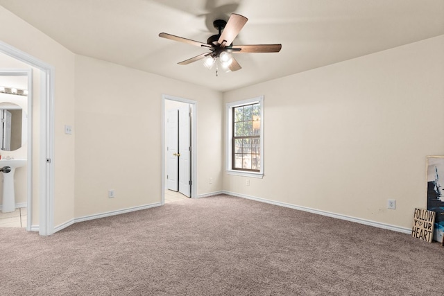 10 Saul St, Lampasas, TX 76550 - unfurnished bedroom featuring light carpet, baseboards, and a sink