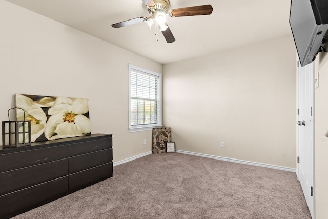 10 Saul St, Lampasas, TX 76550 - carpeted bedroom featuring baseboards and a ceiling fan