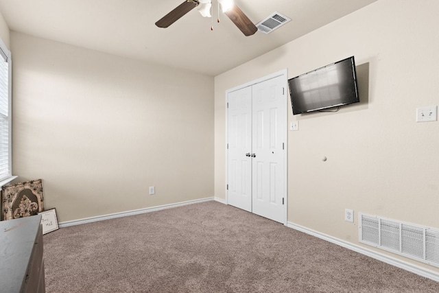 10 Saul St, Lampasas, TX 76550 - unfurnished bedroom with carpet flooring, baseboards, a closet, and ceiling fan