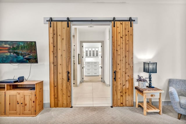 127 Cypress Shores Ln, Kingsland, TX 78639 - hall with carpet and a barn door