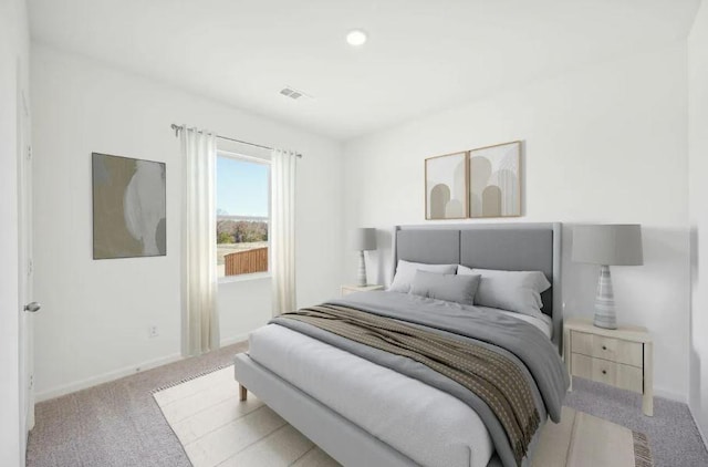 1504 Morris Loop, San Marcos, TX 78666 - bedroom featuring light colored carpet and baseboards