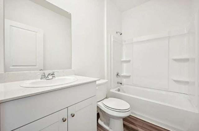 1504 Morris Loop, San Marcos, TX 78666 - full bath featuring toilet, vanity, shower / bathtub combination, and wood finished floors