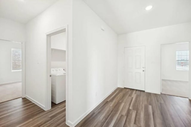 1504 Morris Loop, San Marcos, TX 78666 - additional living space with washer / dryer, wood finished floors, baseboards, and recessed lighting