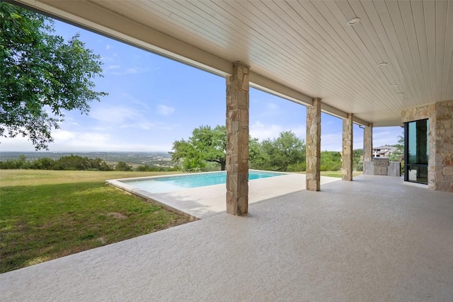 7816 Lynchburg Dr, Austin, TX 78738 - view of patio with exterior kitchen and an outdoor pool
