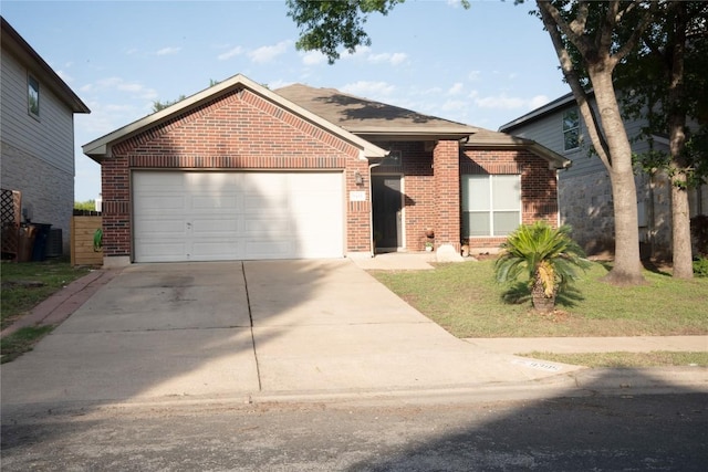 9305 Pioneer Forest Dr, Austin, TX 78744 - view of front facade with brick siding, driveway, a garage, and a front yard
