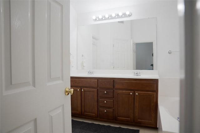 9305 Pioneer Forest Dr, Austin, TX 78744 - full bath with double vanity and a tub to relax in