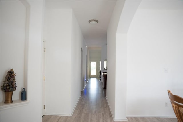 9305 Pioneer Forest Dr, Austin, TX 78744 - corridor featuring light wood finished floors