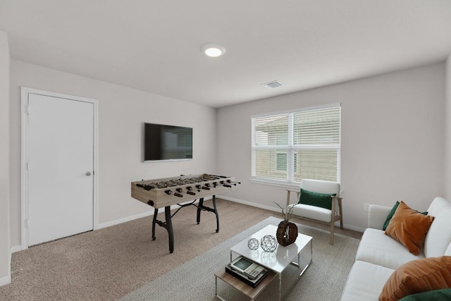 2900 Tweedy Trl, Pflugerville, TX 78660 - living room featuring carpet floors and baseboards