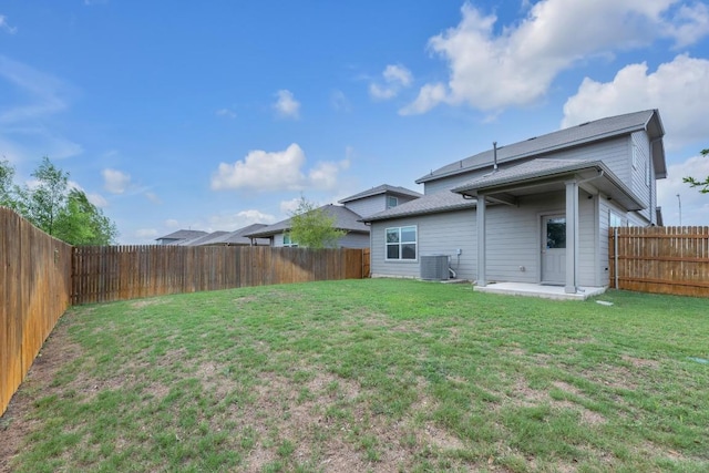2900 Tweedy Trl, Pflugerville, TX 78660 - rear view of property featuring a fenced backyard, a patio, and roof with shingles