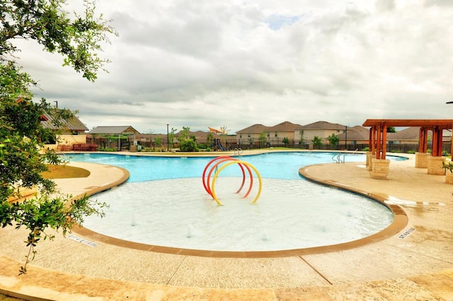 2900 Tweedy Trl, Pflugerville, TX 78660 - community pool featuring a patio