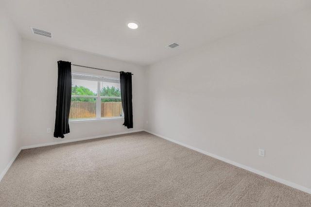 2900 Tweedy Trl, Pflugerville, TX 78660 - spare room with baseboards and carpet flooring