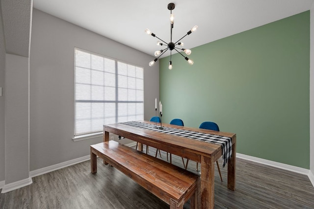 2208 Barnett Dr, Cedar Park, TX 78613 - dining space with a chandelier, wood finished floors, healthy amount of natural light, and baseboards