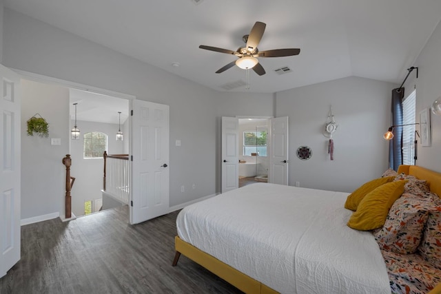 2208 Barnett Dr, Cedar Park, TX 78613 - bedroom featuring wood finished floors, multiple windows, baseboards, a ceiling fan, and vaulted ceiling