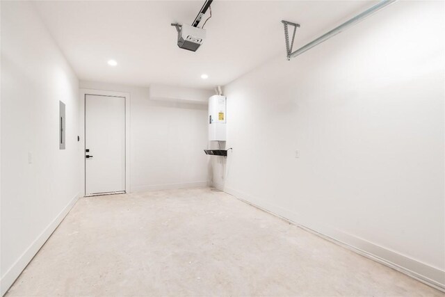 3001 E 51st St Unit 4, Austin, TX 78723 - garage with recessed lighting, a garage door opener, water heater, baseboards, and electric panel
