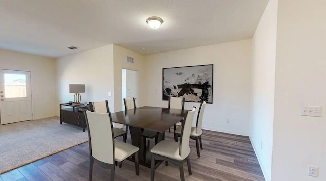 129 Bridgeview Dr, Hutto, TX 78634 - dining area featuring hardwood / wood-style flooring and baseboards