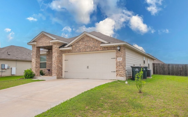 1678 Woodlands Dr, Kyle, TX 78640 - view of front of property featuring concrete driveway and a garage