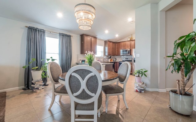 1678 Woodlands Dr, Kyle, TX 78640 - dining area with a chandelier, light tile patterned floors, lofted ceiling, and recessed lighting