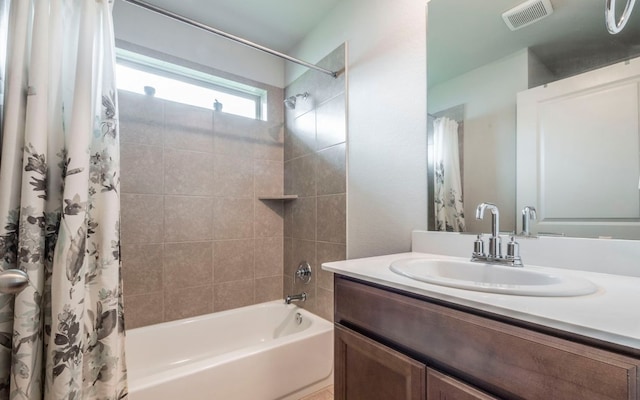 1678 Woodlands Dr, Kyle, TX 78640 - bathroom featuring shower / bathtub combination with curtain and vanity