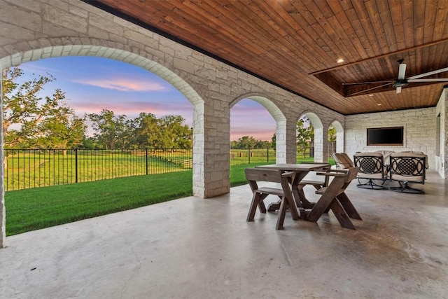 view of patio / terrace with outdoor dining area and ceiling fan