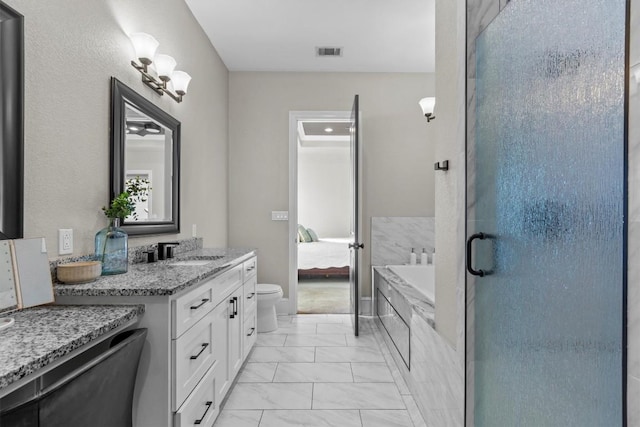 bathroom with marble look tiles, a garden tub, vanity, a shower stall, and connected bathroom