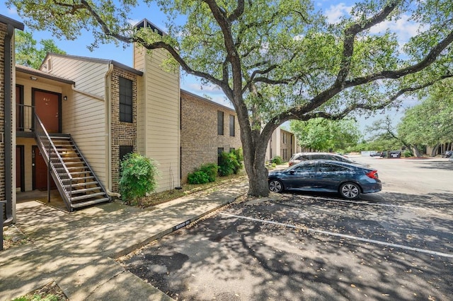 4159 Steck Ave Unit 162, Austin, TX 78759 - uncovered parking lot featuring stairway