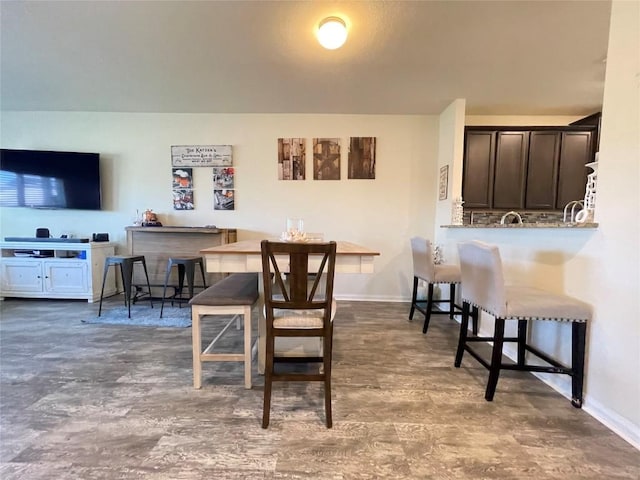 19900 Hubert R Humphrey Rd, Manor, TX 78653 - dining space with baseboards and wood finished floors