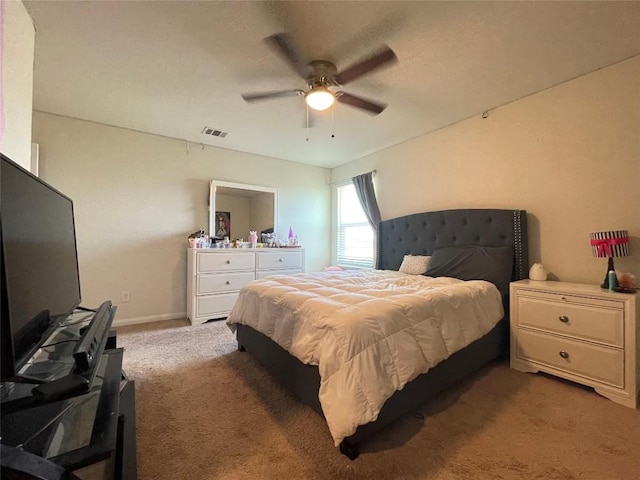 19900 Hubert R Humphrey Rd, Manor, TX 78653 - bedroom featuring light carpet, ceiling fan, and baseboards