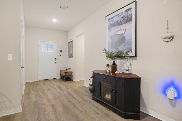 109 Egret Dr, Bastrop, TX 78602 - entryway with light wood-style flooring and baseboards
