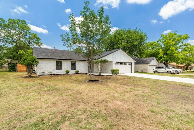 14806 Parco Path, Pflugerville, TX 78660 - single story home with driveway, a garage, and a front yard