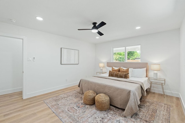 14806 Parco Path, Pflugerville, TX 78660 - bedroom featuring light wood-type flooring, baseboards, a ceiling fan, and recessed lighting