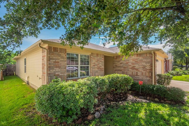 19642 Summerlin Dr, Katy, TX 77449 - view of front of property with an attached garage and brick siding