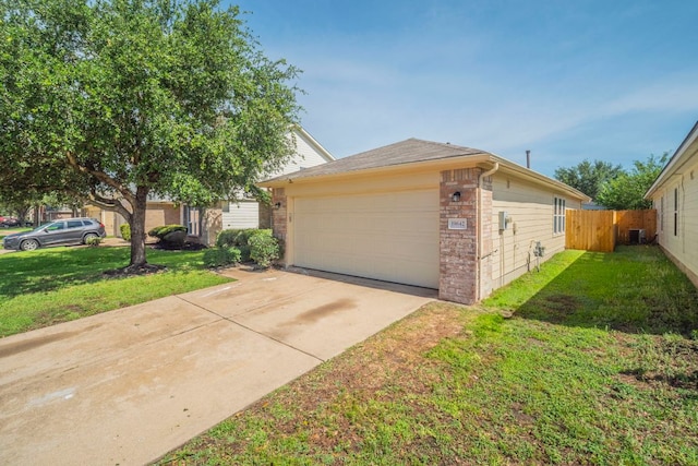 19642 Summerlin Dr, Katy, TX 77449 - view of front of house featuring a garage and brick siding