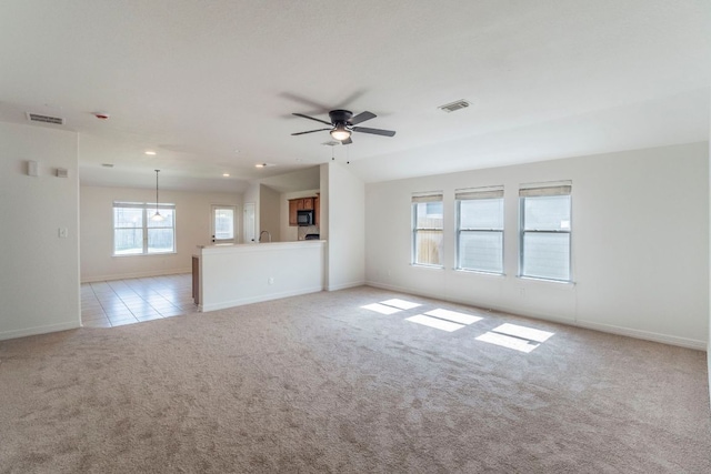 19642 Summerlin Dr, Katy, TX 77449 - unfurnished living room featuring light colored carpet, baseboards, a ceiling fan, and recessed lighting