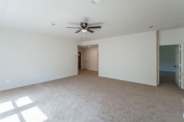 19642 Summerlin Dr, Katy, TX 77449 - spare room featuring light carpet, a ceiling fan, and baseboards